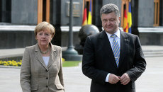 Канцлер Германии Ангела Меркель и президент Украины Петр Порошенко. Архивное фото Канцлер Германии Ангела Меркель и президент Украины Петр Порошенко. Архивное фото