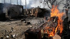 Последствия обстрела Донецка. Архивное фото Последствия обстрела Донецка. Архивное фото