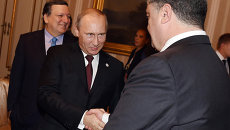 Владимир Путин и Петр Порошенко во время рабочего завтрака в Милане 17 октября 2014 Владимир Путин и Петр Порошенко во время рабочего завтрака в Милане 17 октября 2014