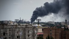 Луганск во время обстрела. Архивное фото Луганск во время обстрела. Архивное фото