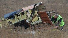 На месте крушения малайзийского Boeing в Донецкой области. Архивное фото На месте крушения малайзийского Boeing в Донецкой области. Архивное фото