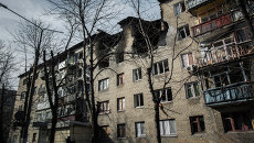 Разрушенный в результате обстрела дом в центре Дебальцево. Архивное фото Разрушенный в результате обстрела дом в центре Дебальцево. Архивное фото