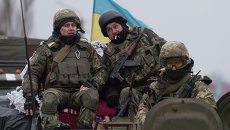 Украинские военнослужащие на бронетехнике возле Артемовска, Донецкая область Украинские военнослужащие на бронетехнике возле Артемовска, Донецкая область