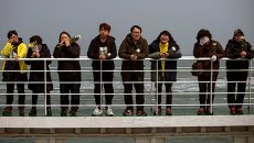 Родственники погибших на пароме Севоль в Южной Корее Родственники погибших на пароме Севоль в Южной Корее