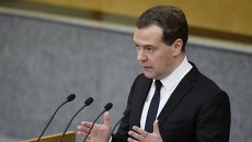 Председатель правительства России Дмитрий Медведев выступает в Государственной Думе РФ с отчетом правительства Председатель правительства России Дмитрий Медведев выступает в Государственной Думе РФ с отчетом правительства