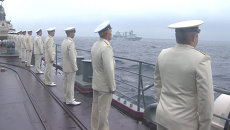 Моряки с борта эсминца наблюдали за парадом кораблей РФ и КНР во Владивостоке Моряки с борта эсминца наблюдали за парадом кораблей РФ и КНР во Владивостоке