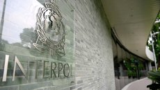 Логотип международной организация уголовной полиции – Интерпол. Архивное фото Логотип международной организация уголовной полиции – Интерпол. Архивное фото