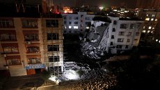 Пострадавшее от взрыва жилое здание в уезде Лючэн в Гуанси-Чжуанском автономном районе на юге Китая. 30 сентября 2015 Пострадавшее от взрыва жилое здание в уезде Лючэн в Гуанси-Чжуанском автономном районе на юге Китая. 30 сентября 2015
