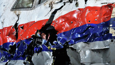 Представление доклада об обстоятельствах крушения лайнера Boeing 777 Malaysia Airlines (рейс MH17) на Востоке Украины 17 июля 2014 года на военной базе Гилзе-Рейен в Нидерландах Представление доклада об обстоятельствах крушения лайнера Boeing 777 Malaysia Airlines (рейс MH17) на Востоке Украины 17 июля 2014 года на военной базе Гилзе-Рейен в Нидерландах
