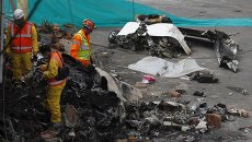 На месте падения небольшого самолета на здание пекарни в Боготе, Колумбия. Октябрь 2015 На месте падения небольшого самолета на здание пекарни в Боготе, Колумбия. Октябрь 2015