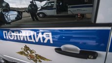 Машина полиции. Архивное фото Машина полиции. Архивное фото