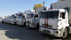 Автомобили конвоя с гуманитарной помощью для жителей Донецкой и Луганской областей. Архивное фото Автомобили конвоя с гуманитарной помощью для жителей Донецкой и Луганской областей. Архивное фото