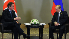 Президент России Владимир Путин и премьер-министр Соединенного Королевства Великобритании и Северной Ирландии Дэвид Кэмерон во время встречи на полях саммита Группы двадцати Президент России Владимир Путин и премьер-министр Соединенного Королевства Великобритании и Северной Ирландии Дэвид Кэмерон во время встречи на полях саммита Группы двадцати