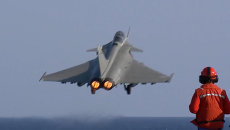 Взлет истребителей Rafale с авианосца Шарль де Голль для ударов по ИГ Взлет истребителей Rafale с авианосца Шарль де Голль для ударов по ИГ