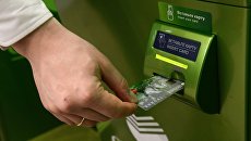 Демонстрирация работы карты в рамках презентации совместного проекта Сбербанка. Архивное фото Демонстрирация работы карты в рамках презентации совместного проекта Сбербанка. Архивное фото