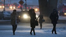 Снегопад в Москве. Архивное фото Снегопад в Москве. Архивное фото
