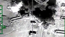 Уничтожение российской авиацией открытых нефтехранилищ ИГ (Исламское государство) в провинции Хама Уничтожение российской авиацией открытых нефтехранилищ ИГ (Исламское государство) в провинции Хама