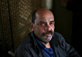 Инвалид Шахрур у себя дома, Ирбин, Сирия Инвалид Шахрур у себя дома, Ирбин, Сирия