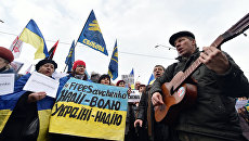 Митинг в поддержку украинской военнослужащей Надежды Савченко в Киеве, Украина. 9 марта 2016 Митинг в поддержку украинской военнослужащей Надежды Савченко в Киеве, Украина. 9 марта 2016