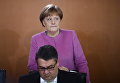 Канцлер Германии Ангела Меркель и министр экономики Зигмар Габриэль на заседании правительства Германии Канцлер Германии Ангела Меркель и министр экономики Зигмар Габриэль на заседании правительства Германии