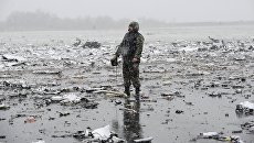 На месте крушения пассажирского самолета Boeing-737-800, который разбился при посадке в аэропорту Ростова-на-Дону. Архивное фото На месте крушения пассажирского самолета Boeing-737-800, который разбился при посадке в аэропорту Ростова-на-Дону. Архивное фото