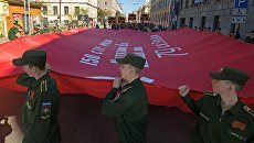 Патриотическая акция Бессмертный полк в Санкт-Петербурге. Архивное фото Патриотическая акция Бессмертный полк в Санкт-Петербурге. Архивное фото
