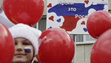 Участники парада Наша Крымская весна, посвященного годовщине воссоединения Крыма с Россией. Архивное фото Участники парада Наша Крымская весна, посвященного годовщине воссоединения Крыма с Россией. Архивное фото
