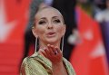 Телеведущая, олимпийская чемпионка по фигурному катанию Татьяна Навка перед началом церемонии закрытия 38-го Московского международного кинофестиваля Телеведущая, олимпийская чемпионка по фигурному катанию Татьяна Навка перед началом церемонии закрытия 38-го Московского международного кинофестиваля
