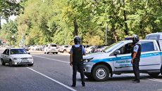 Последствия перестрелки возле отделения полиции в Алма-Ате Последствия перестрелки возле отделения полиции в Алма-Ате