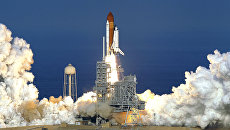 Старт шаттла Discovery. Архивное фото Старт шаттла Discovery. Архивное фото