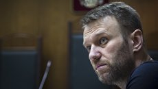 Алексей Навальный во время судебного слушания. Архивное фото Алексей Навальный во время судебного слушания. Архивное фото