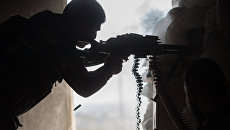 Военнослужащий Сирийской армии. Архивное фото Военнослужащий Сирийской армии. Архивное фото