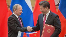 Президент России Владимир Путин и председатель Китайской Народной Республики (КНР) Си Цзиньпин. Архивное фото Президент России Владимир Путин и председатель Китайской Народной Республики (КНР) Си Цзиньпин. Архивное фото