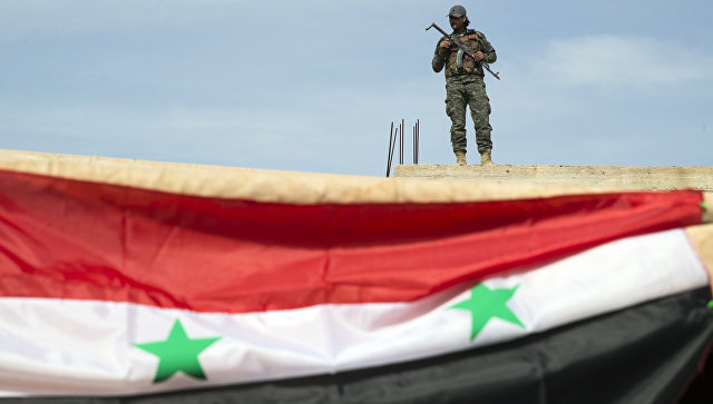 Сирийский военный возле города Хама, Сирия. Архивное фото