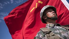 Военнослужащий во время международных антитеррористических учений ШОС Мирная миссия-2016 Военнослужащий во время международных антитеррористических учений ШОС Мирная миссия-2016