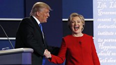 Кандидаты в президенты США Хиллари Клинтон и Дональд Трамп во время дебатов. 26 сентября 2016 Кандидаты в президенты США Хиллари Клинтон и Дональд Трамп во время дебатов. 26 сентября 2016