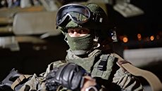 Военнослужащий в экипировке Ратник. Архивное фото Военнослужащий в экипировке Ратник. Архивное фото