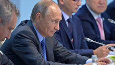 Президент РФ Владимир Путин во время встречи с председателем Китайской Народной Республики Си Цзиньпином в отеле Тадж Экзотик индийского штата Гоа Президент РФ Владимир Путин во время встречи с председателем Китайской Народной Республики Си Цзиньпином в отеле Тадж Экзотик индийского штата Гоа