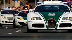 Автомобили Bugatti, Lamborghini и Bentley полиции Дубая. Архивное фото Автомобили Bugatti, Lamborghini и Bentley полиции Дубая. Архивное фото