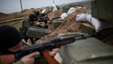 Украинские военные у села Широкино Донецкой области. Архивное фото Украинские военные у села Широкино Донецкой области. Архивное фото