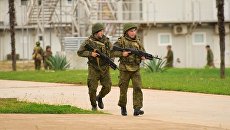 Военнослужащие российской военной базы в Абхазии во время тренировки по противодействию терроризму Военнослужащие российской военной базы в Абхазии во время тренировки по противодействию терроризму