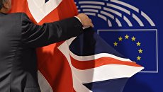 Флаг Великобритании в здании Европарламента в Брюсселе. Архивное фото Флаг Великобритании в здании Европарламента в Брюсселе. Архивное фото