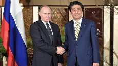 Официальный визит президента РФ Владимира Путина в Японию. 15 декабря 2016. Архивное фото Официальный визит президента РФ Владимира Путина в Японию. 15 декабря 2016. Архивное фото