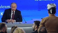 Президент РФ Владимир Путин на двенадцатой большой ежегодной пресс-конференции в Центре международной торговли на Красной Пресне Президент РФ Владимир Путин на двенадцатой большой ежегодной пресс-конференции в Центре международной торговли на Красной Пресне