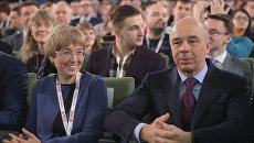 Первый заместитель председателя Банка России Ксения Юдаева и министр финансов РФ Антон Силуанов на VIII Гайдаровском форуме. 13 января 2017 Первый заместитель председателя Банка России Ксения Юдаева и министр финансов РФ Антон Силуанов на VIII Гайдаровском форуме. 13 января 2017