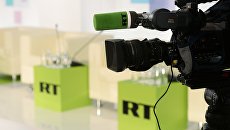 Логотип телеканала RT. Архивное фото Логотип телеканала RT. Архивное фото