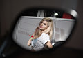 Модель на выставке Motorsport Expo в КВЦ Сокольники в Москве Модель на выставке Motorsport Expo в КВЦ Сокольники в Москве