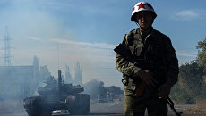 Отвод вооружений калибра менее 100 миллиметров от линии соприкосновения в самопровозглашенной Луганской народной республике. Архивное фото Отвод вооружений калибра менее 100 миллиметров от линии соприкосновения в самопровозглашенной Луганской народной республике. Архивное фото