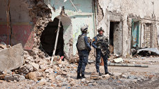 Военнослужащие иракской армии на огневой позиции в Мосуле. Архивное фото Военнослужащие иракской армии на огневой позиции в Мосуле. Архивное фото