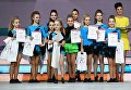 Спортсмены во время церемонии награждения на всероссийских соревнованиях по акробатическому рок-н-роллу Rock’n’Roll &CO. в Москве Спортсмены во время церемонии награждения на всероссийских соревнованиях по акробатическому рок-н-роллу Rock’n’Roll &CO. в Москве